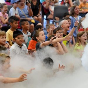little kids reaching for the smoke
