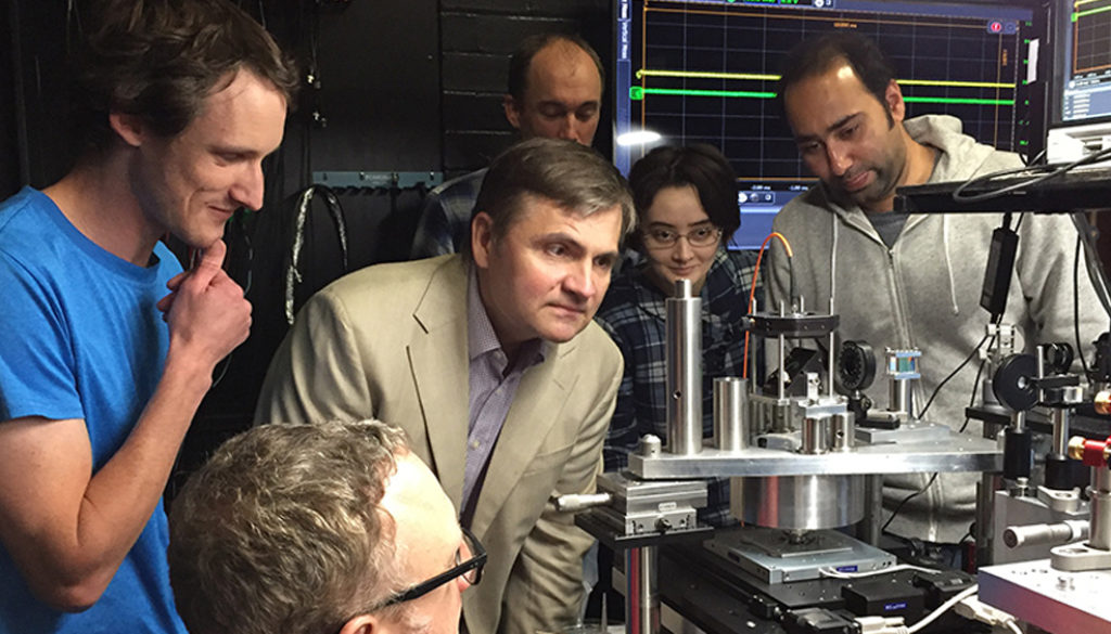 Dr. Vladislav Yakovlev, center, visiting Professor Warwick Bowen's lab at the University of Queensland. | Image: International Society for Optics and Photonics