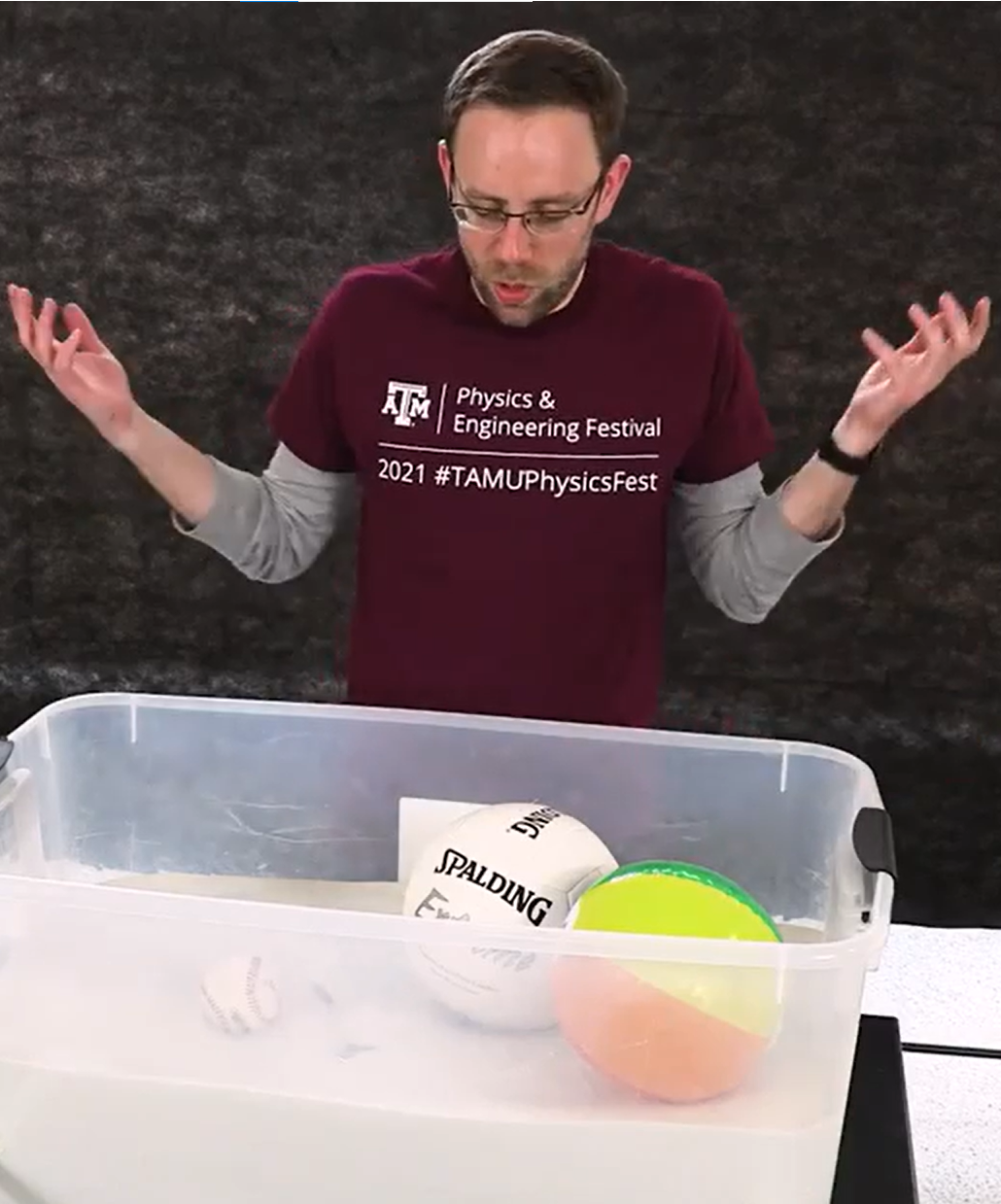 Dr Dawson Nodurft teaching a physics demonstration